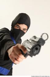 VLASTIMIL KNEELING POSE WITH GUN